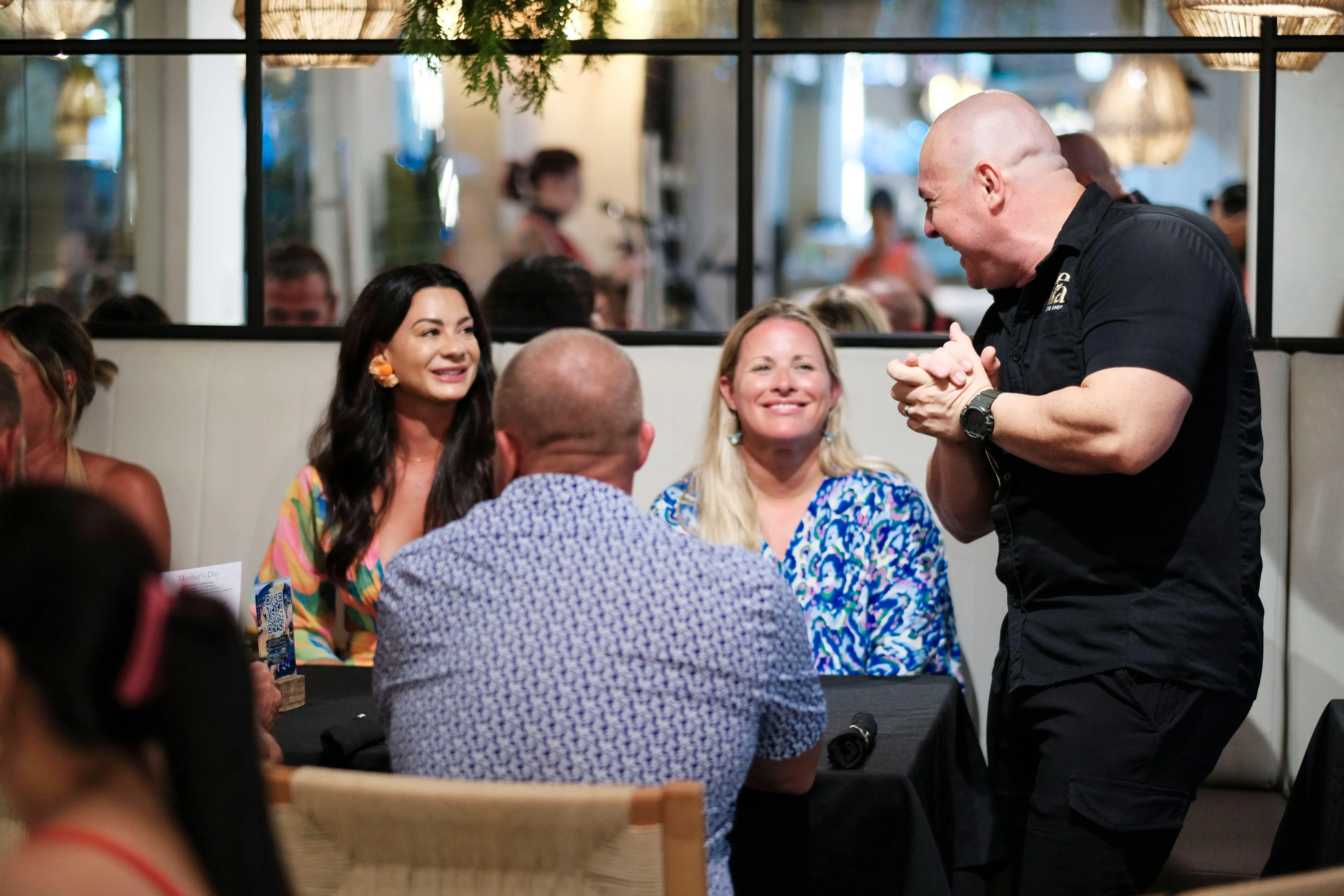 Welcoming guests at Zona K Atelier, restaurant in Jaco, Costa Rica