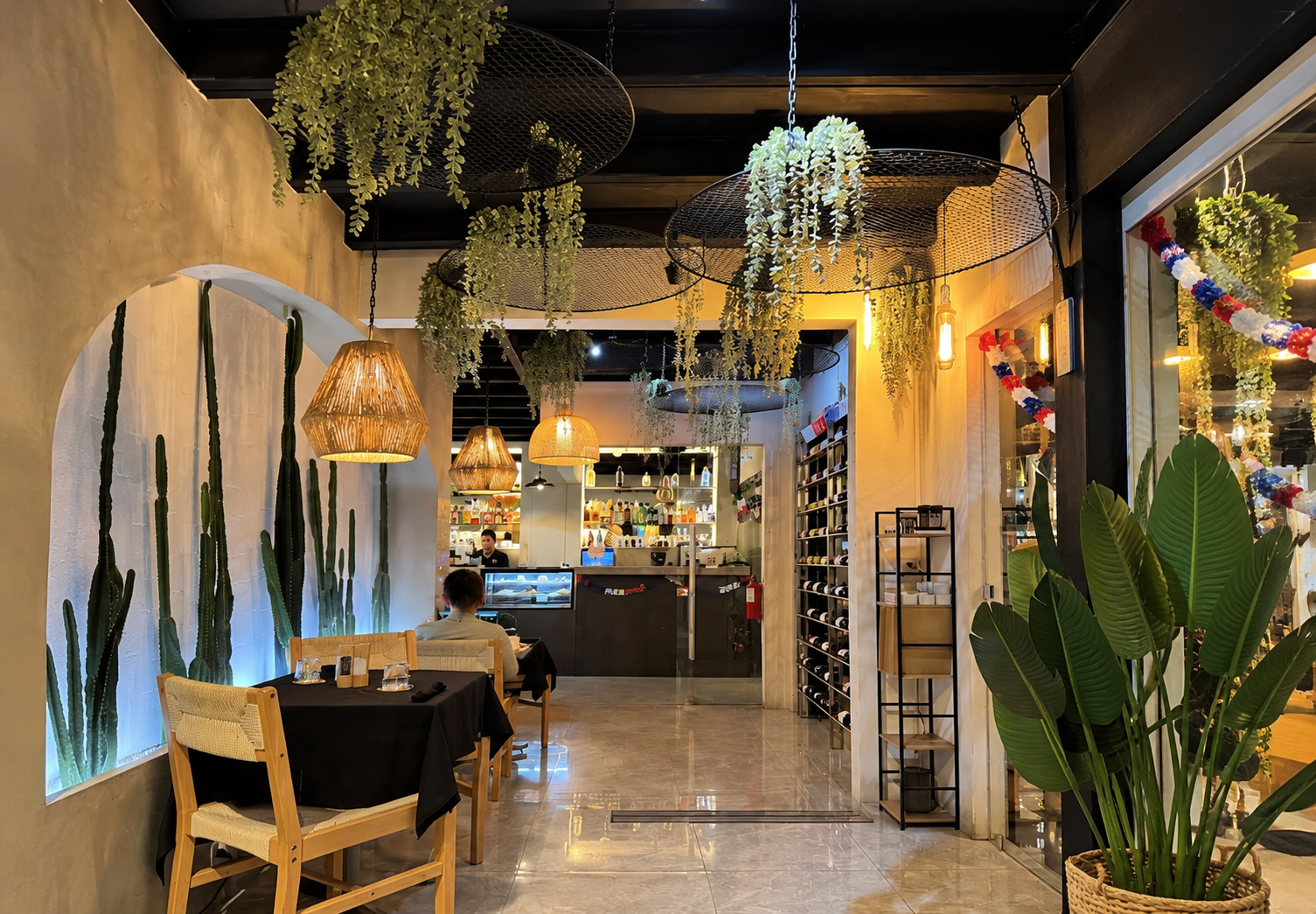 Dining area at Zona K Atelier, restaurant in Jaco, Costa Rica